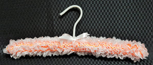 Child's knitted lace coathanger